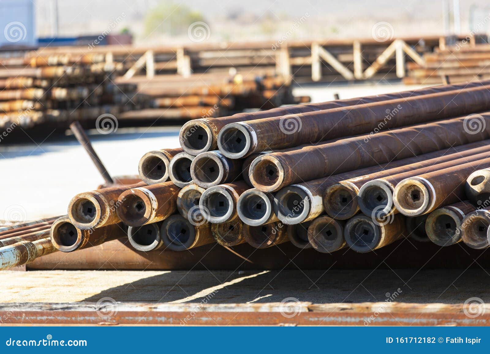 Rust Pipe and Drill Bits Used in the Oil Industry Stock Photo Image