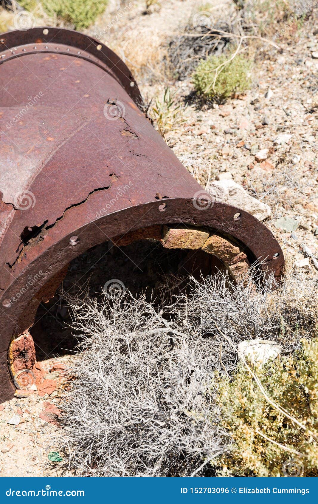 Rusted Brick Kiln Broken and Spilling Out Onto the Ground Stock Photo