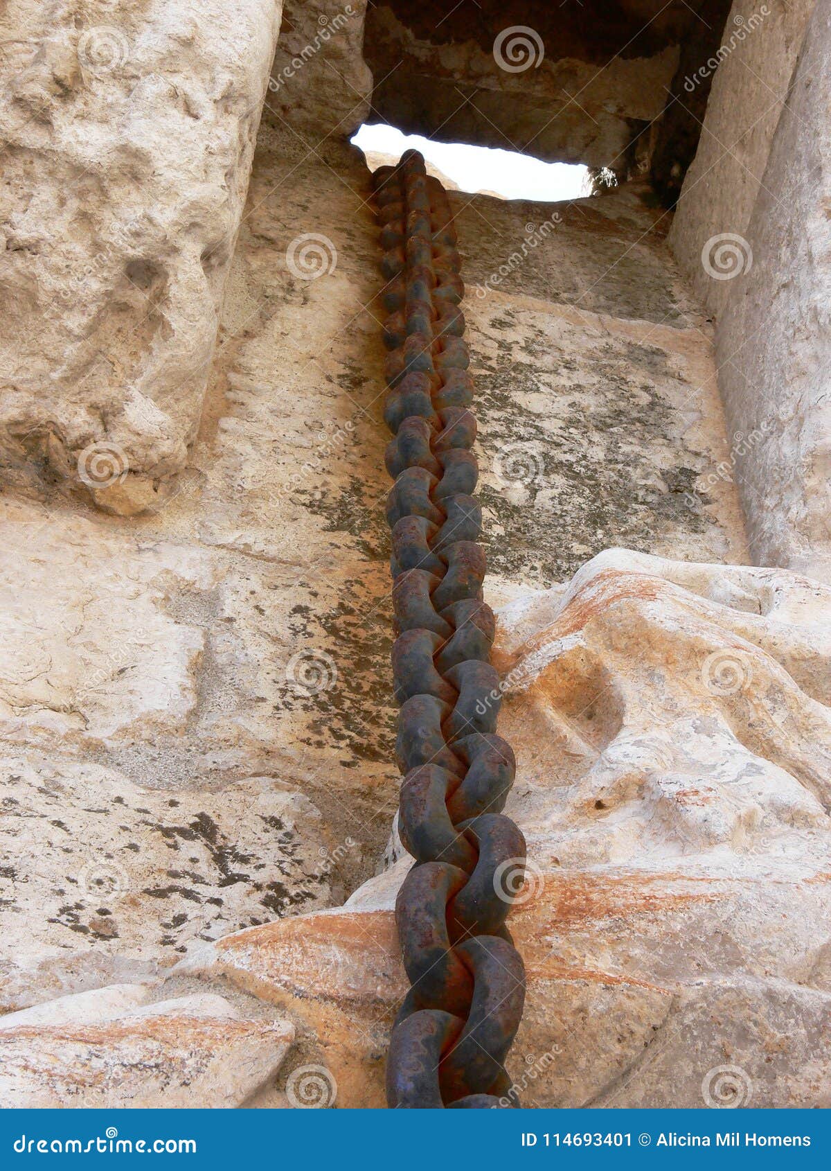 Rusted Chain Hanging on a Stone Wall Stock Image Image of wall, heavy