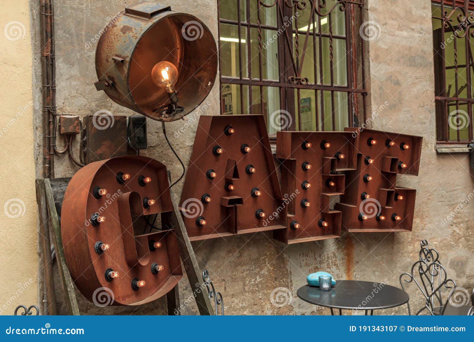 rusted color word cafe with lights