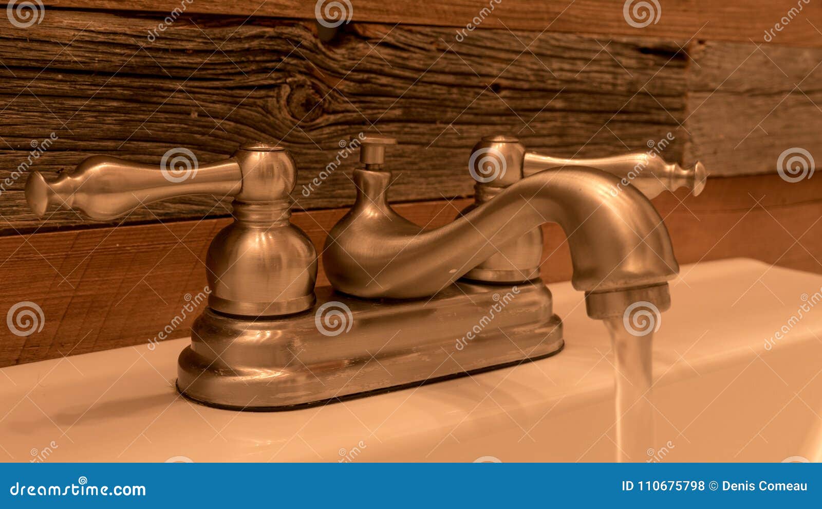 Rustic Bathroom Faucet With Weathered Wood Wall Background Morning