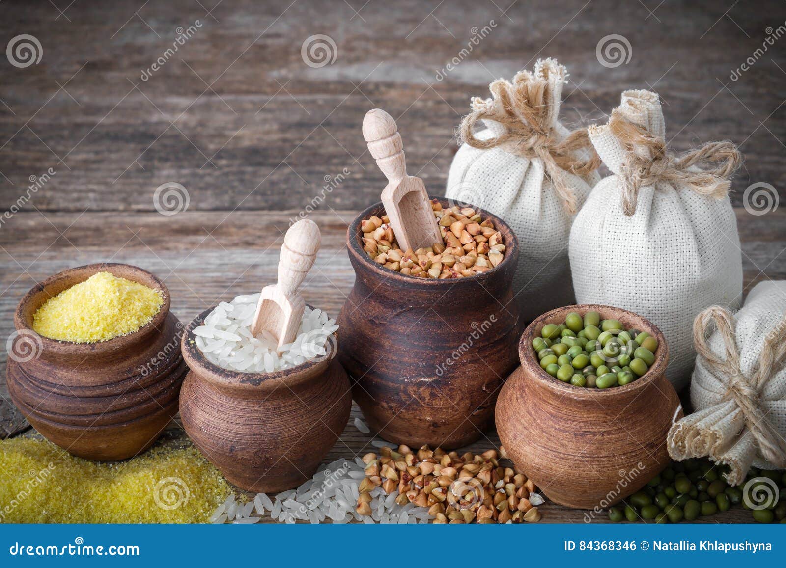 Rustic Clay Pots Filled with Grains and Hessian Bags. Stock Photo ...