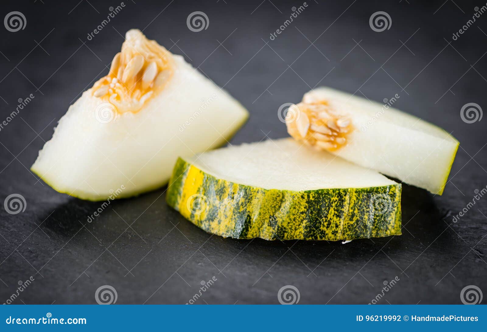 rustic slate slab with fresh futuro melon & x28;selective focus& x29;