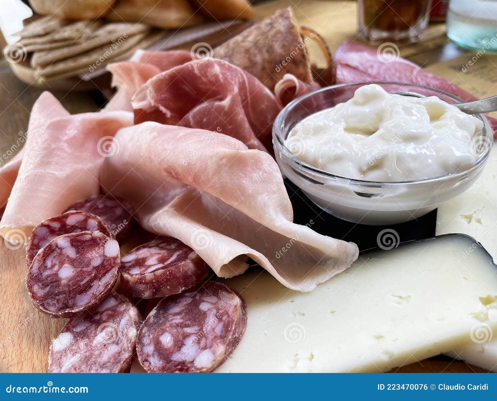 rustic wooden serving tray with typical products of italian emilia-romagna region