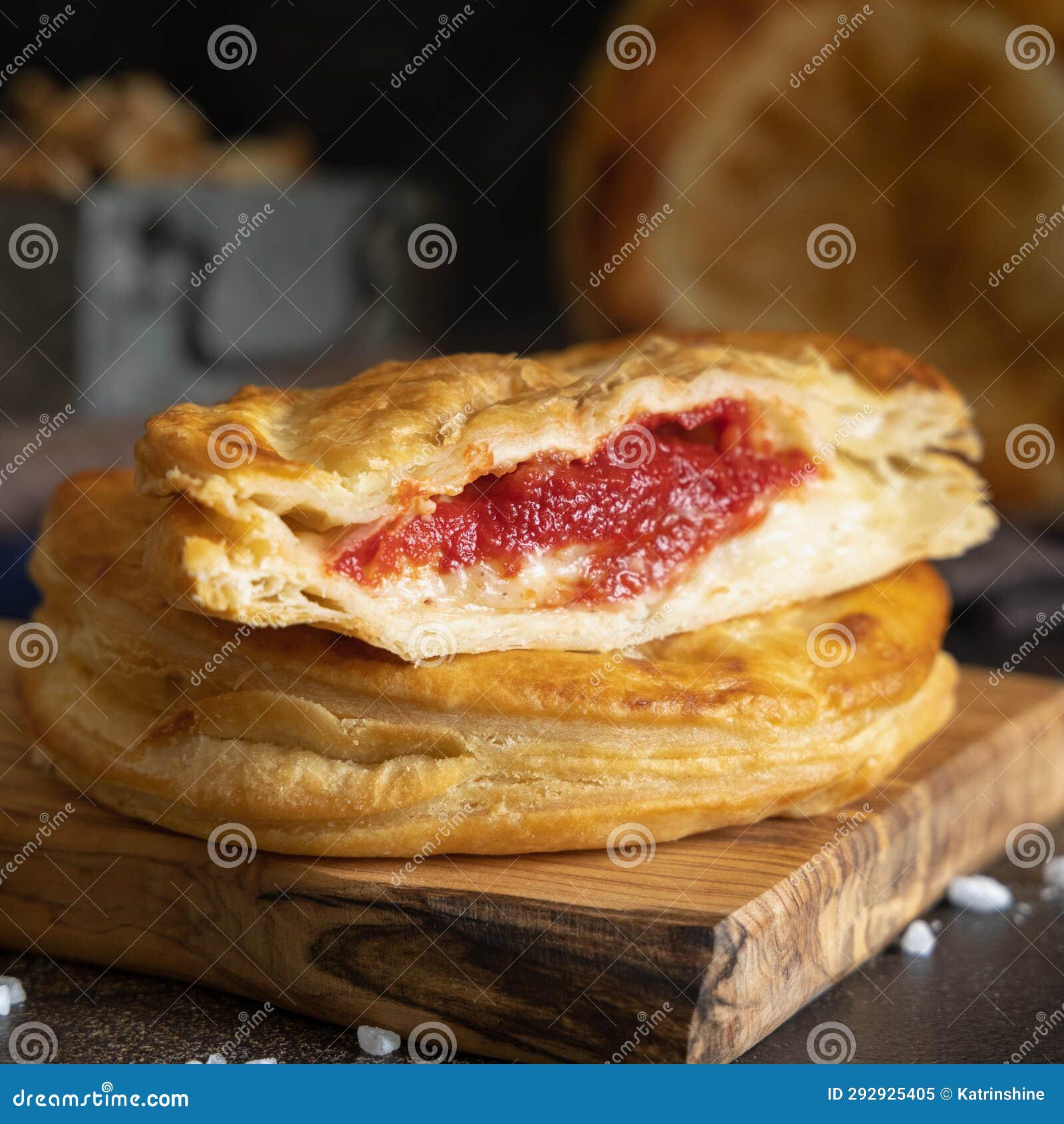 rustico puff pastry from lecce filled with stuffed with tomato, mozzarella and bechamel sauce