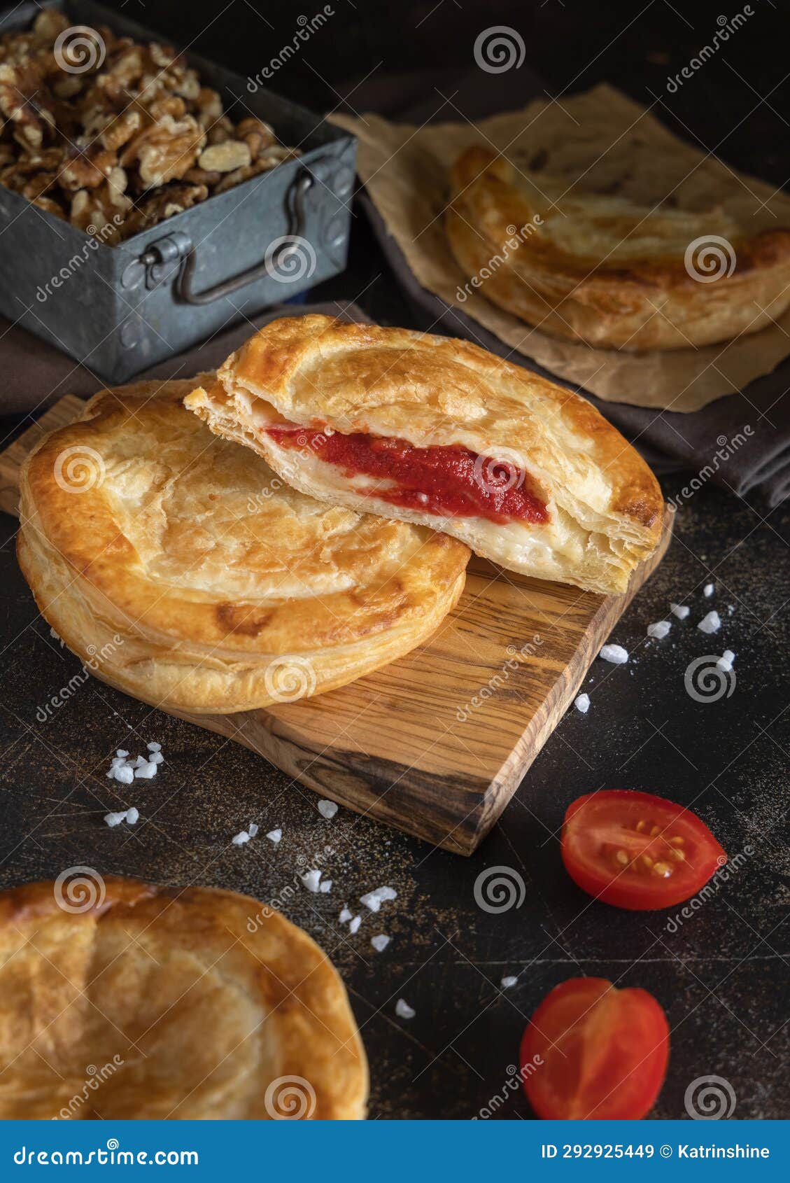 rustico puff pastry from lecce filled with stuffed with tomato, mozzarella and bechamel sauce