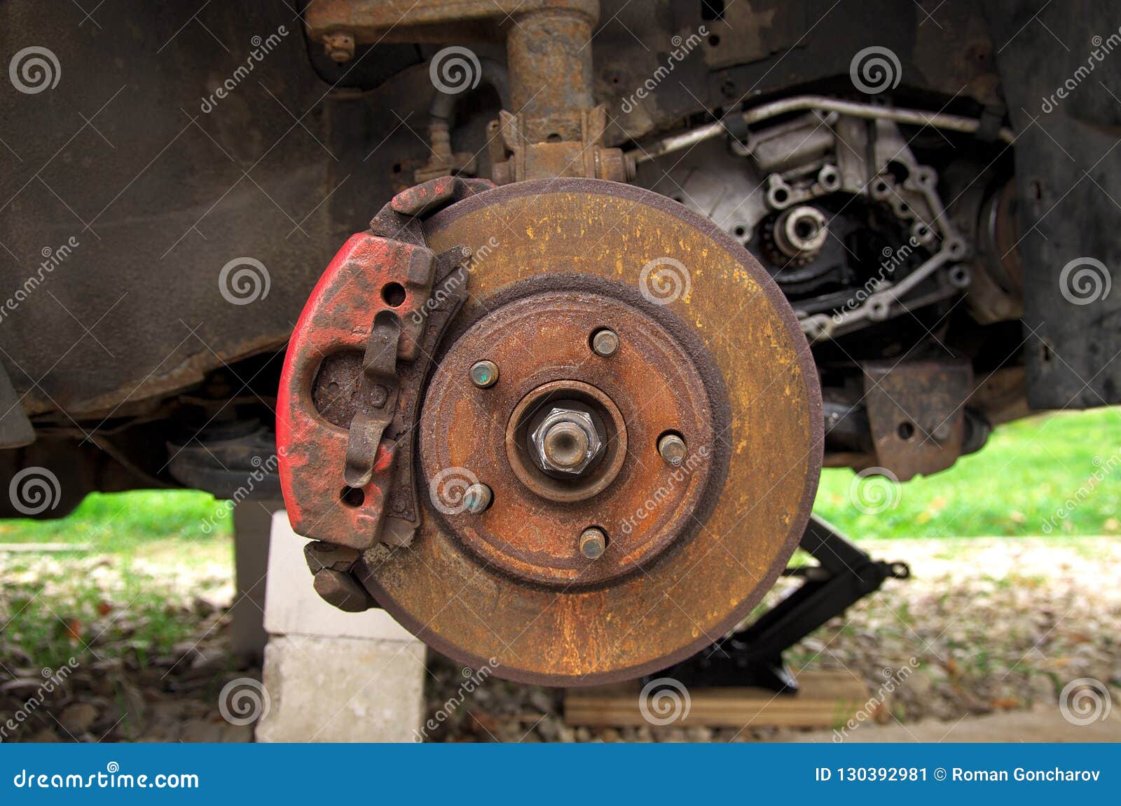 Rusty Brake Disc on a Broken Car in the Yard Stock Image Image of hose, brick 130392981