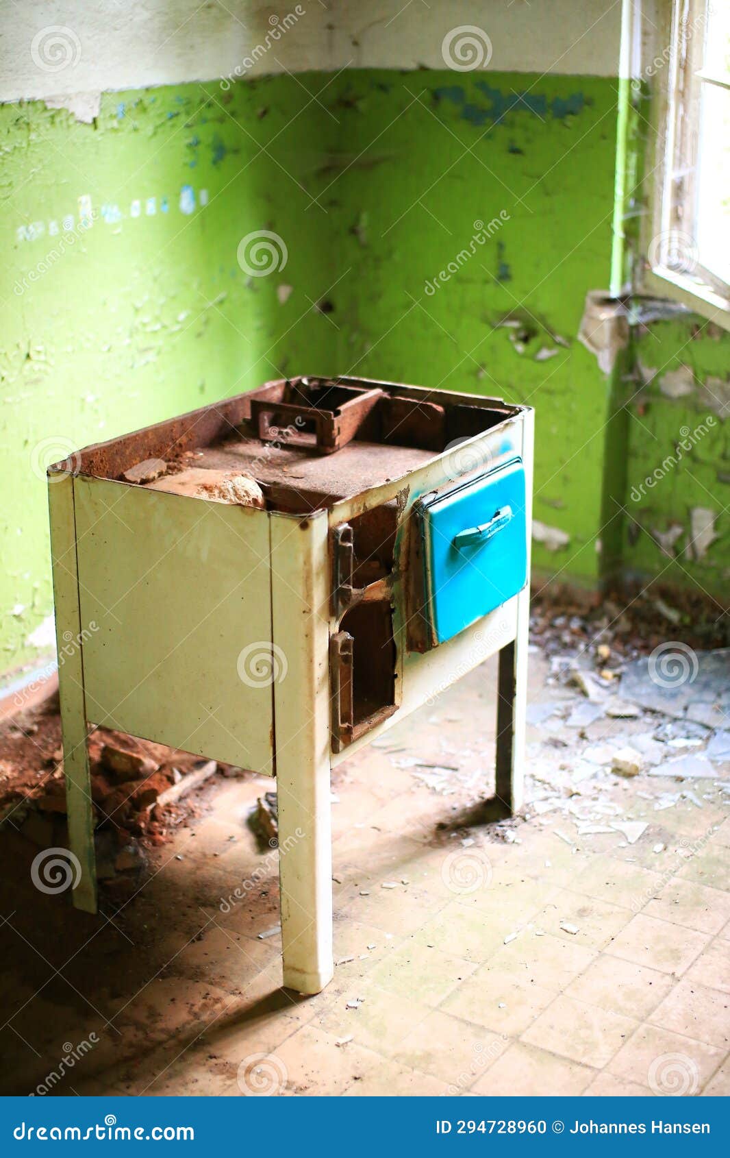 Rusty and Damage Cast Iron Stove in an Abandoned Building Stock Photo