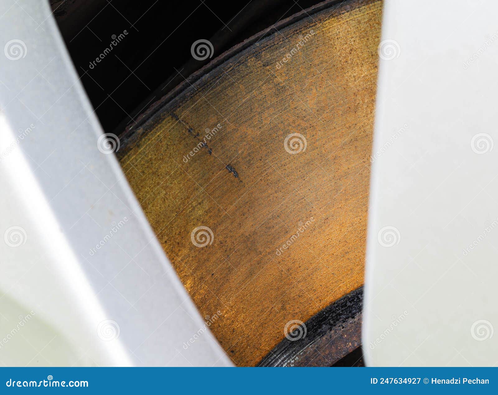 Rusty, Defective Brake Disc with a Shoulder on the Edge. Worn Brake