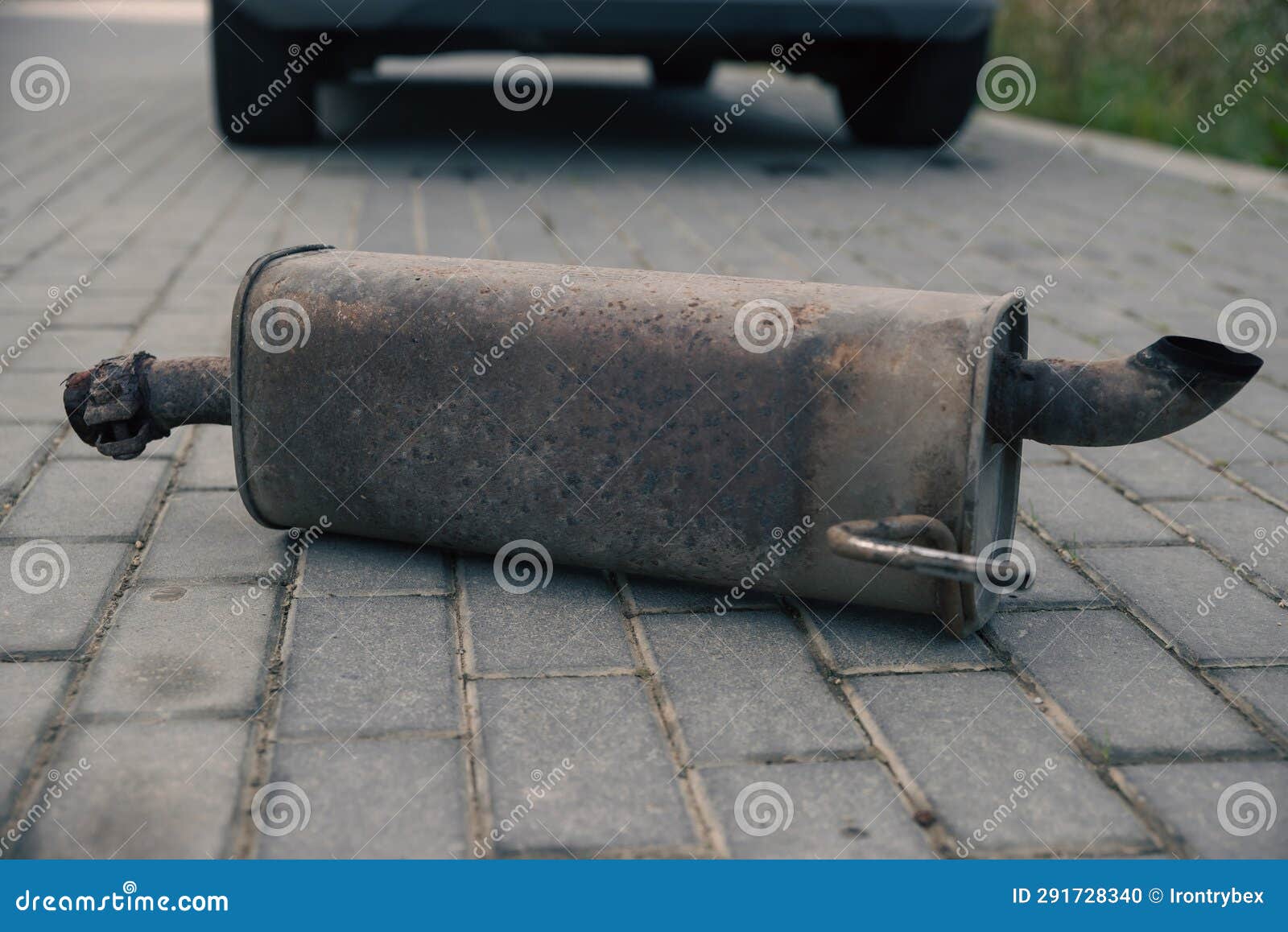 The Rusty Exhaust Pipe, the Car S Muffler Has Fallen Off and is Lying