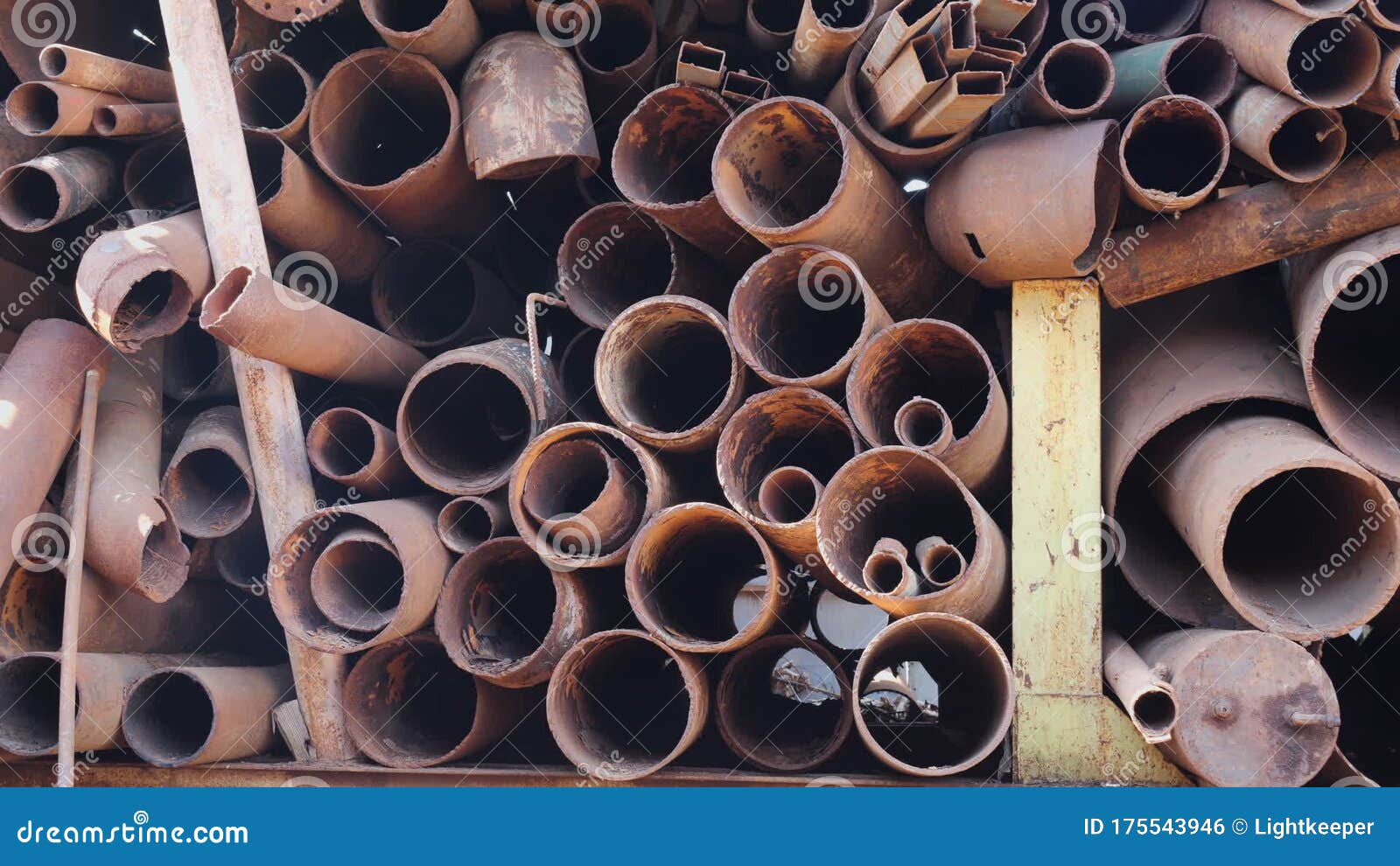 Rusty Metal Pipes Stacked at the Recycling Scrapyard Stock Footage