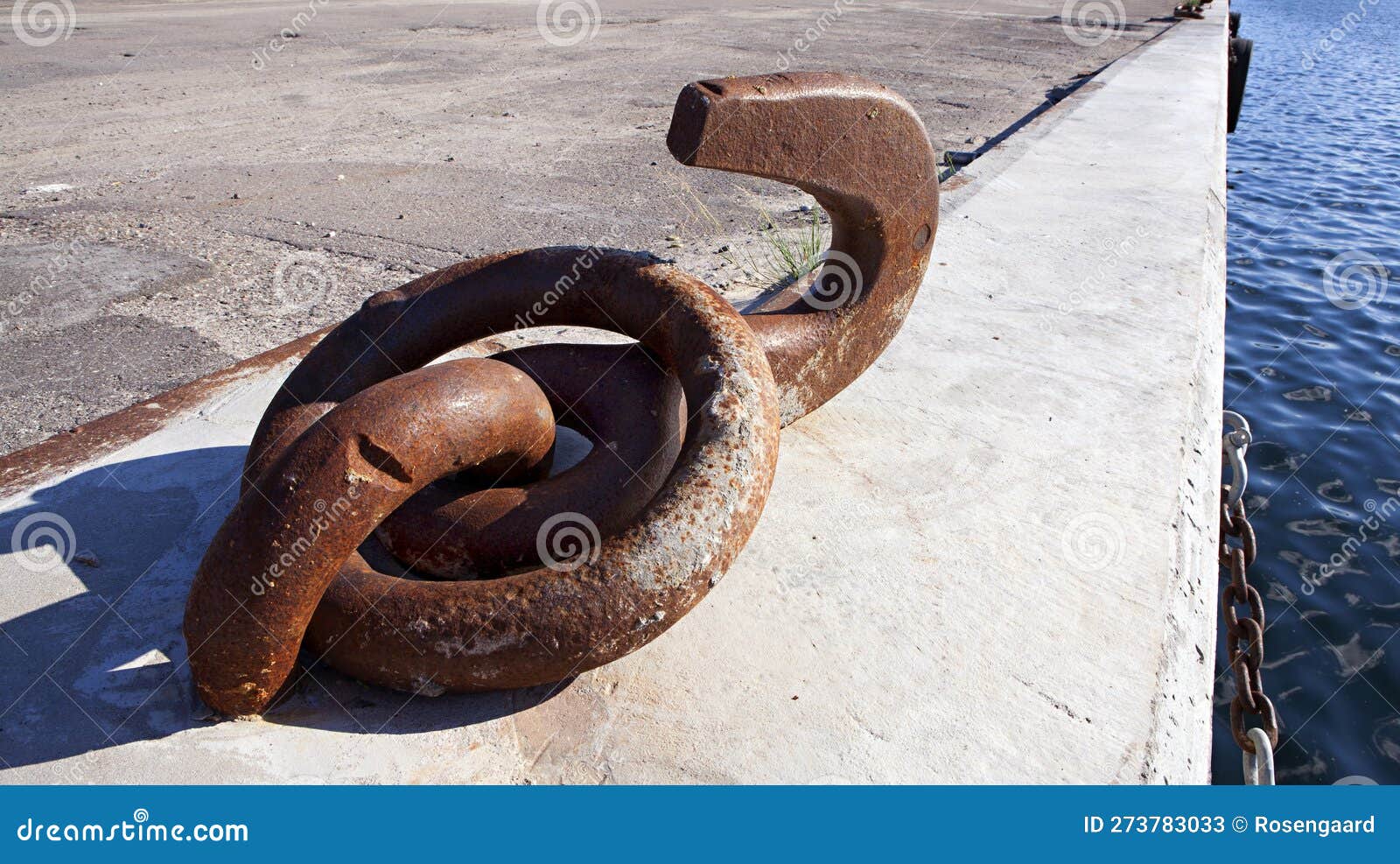 Rusty Mooring Post With Ship Ropes On An Old Ferry. Bollard With