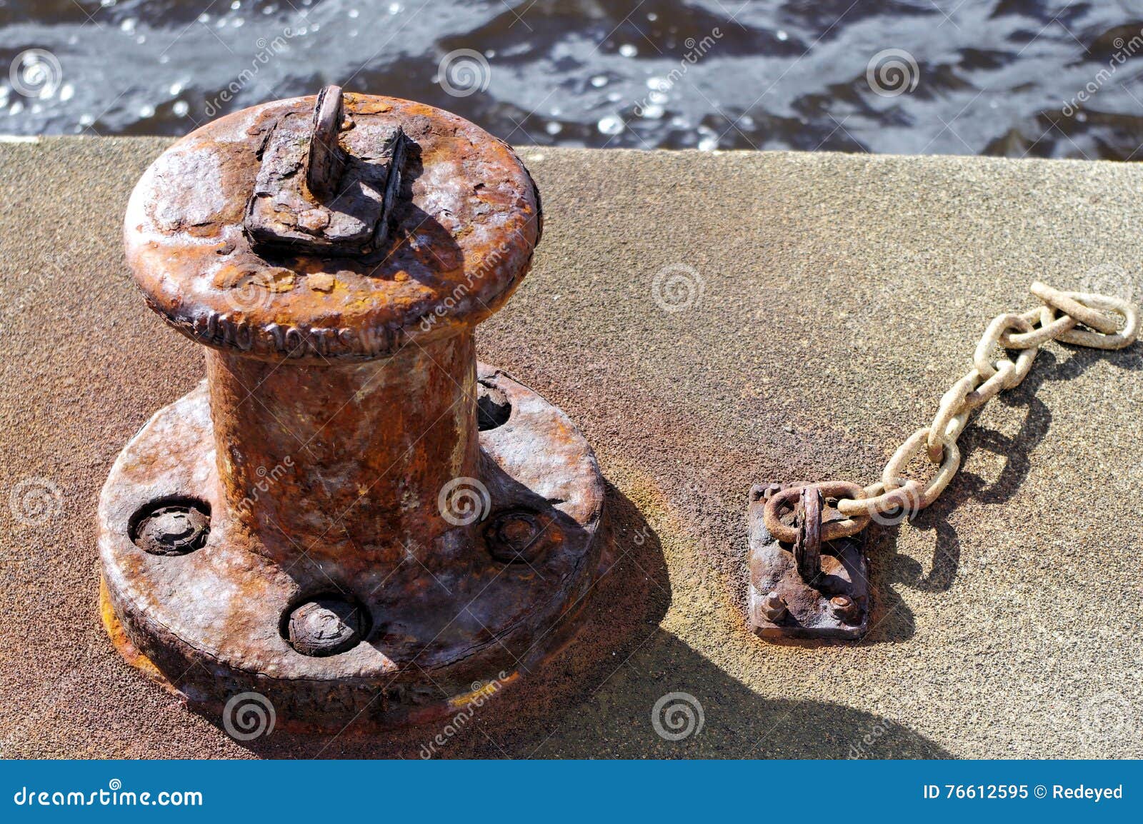 rusty old mooring bollard