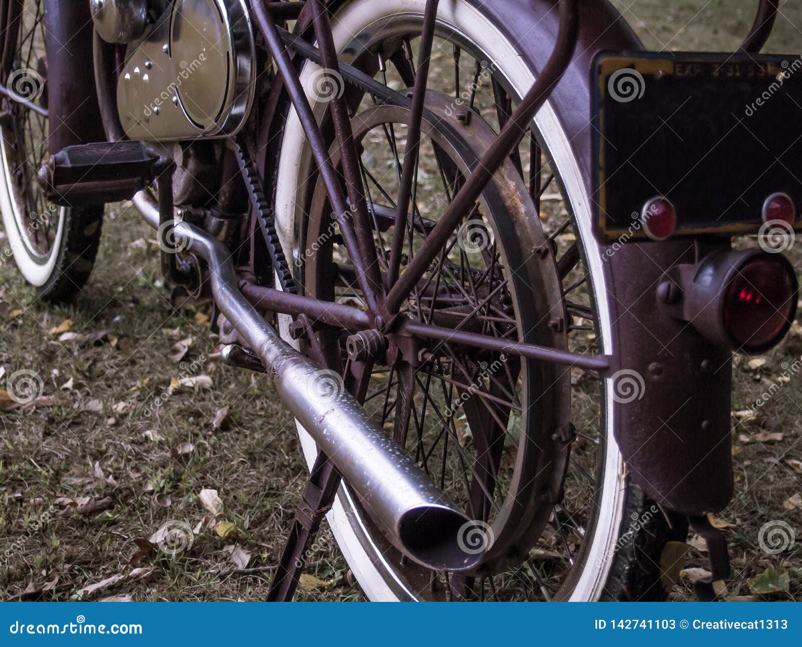 Rusty Motorized Retrofit Bicycle with White Wall Tires Stock Image