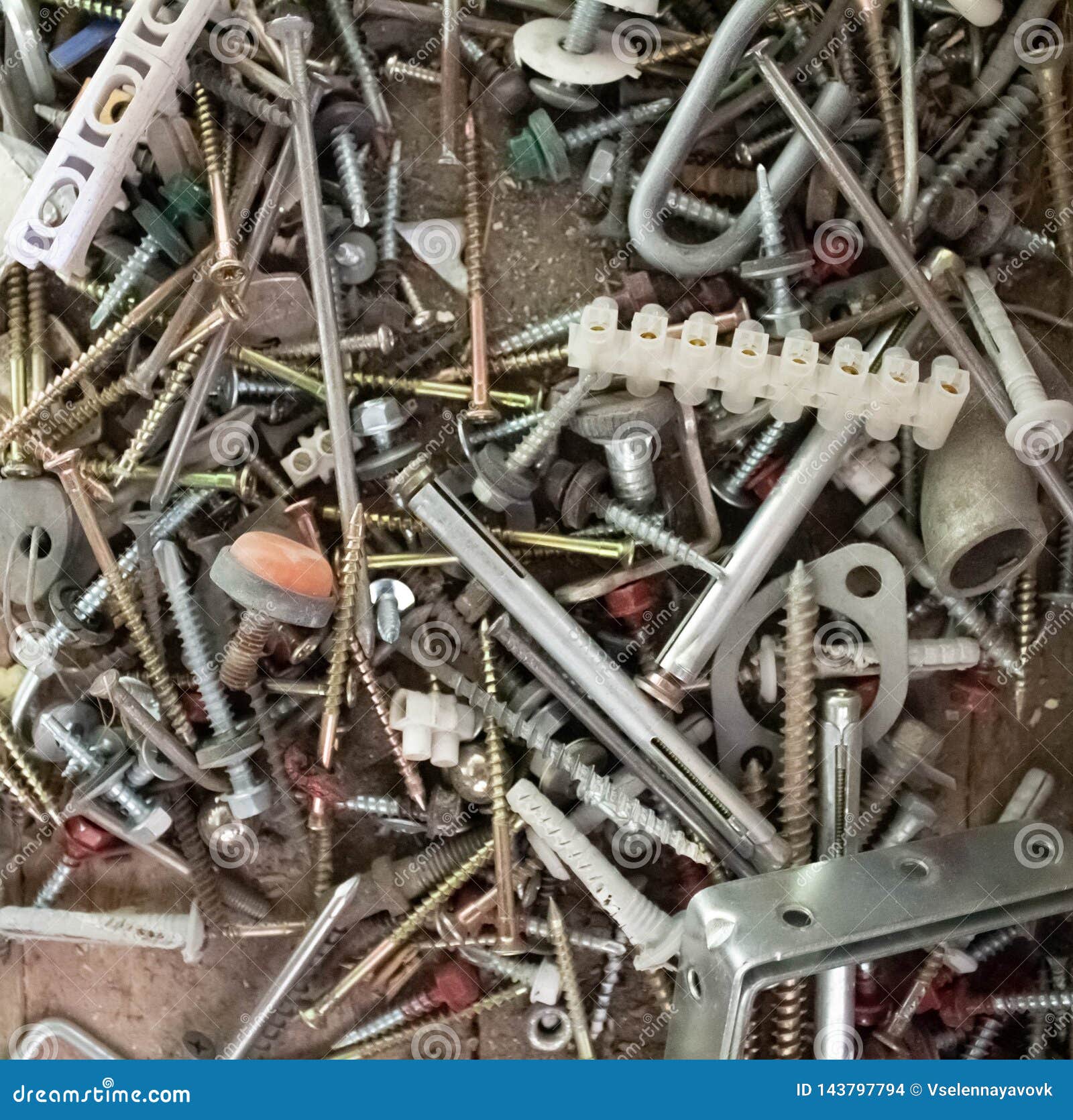 Rusty on a wooden background, mechanic concept, sme concept. steel background. Pile of metal Scrap, Bolt, Nut.