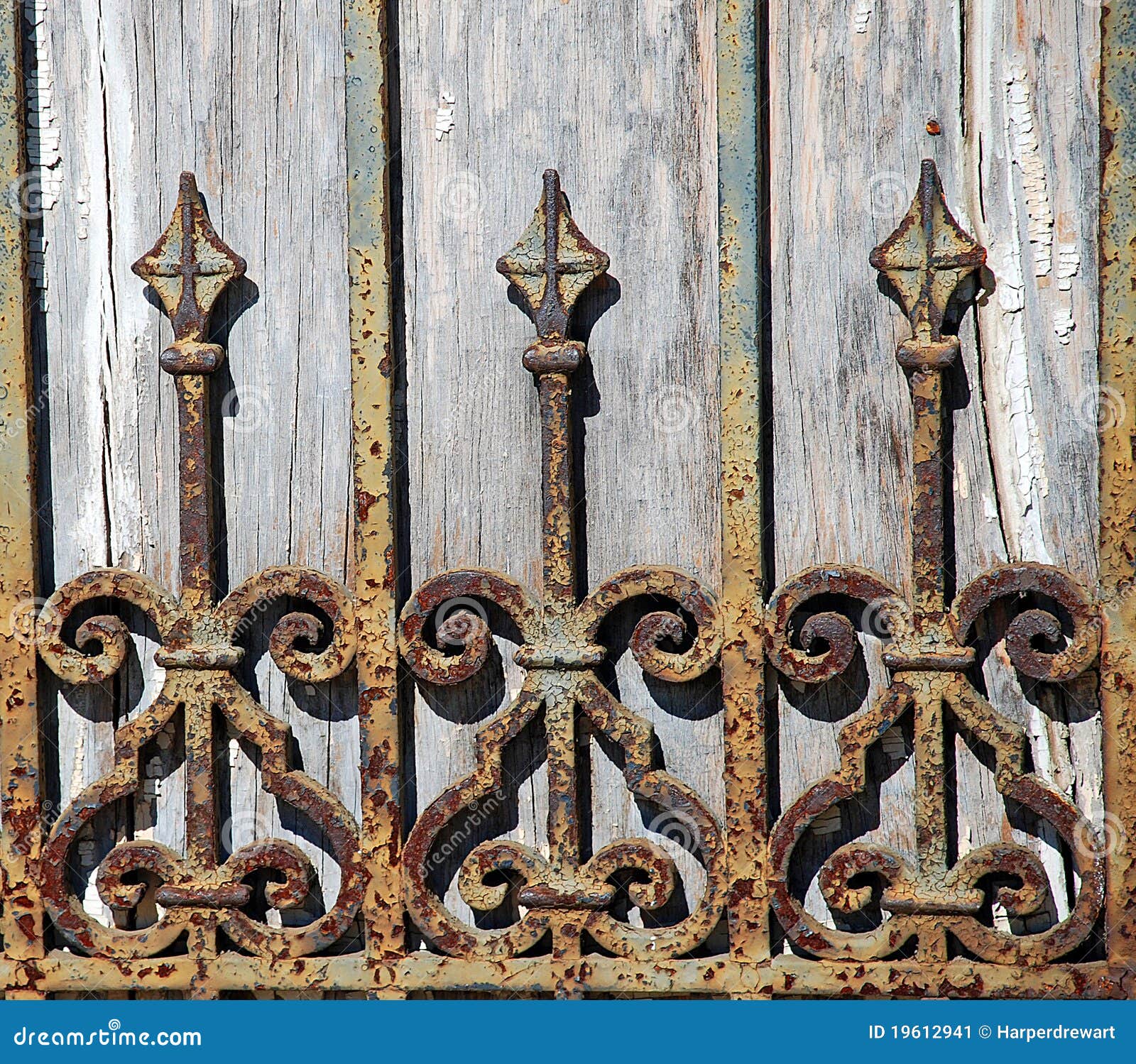 rusty wrought iron fence detail