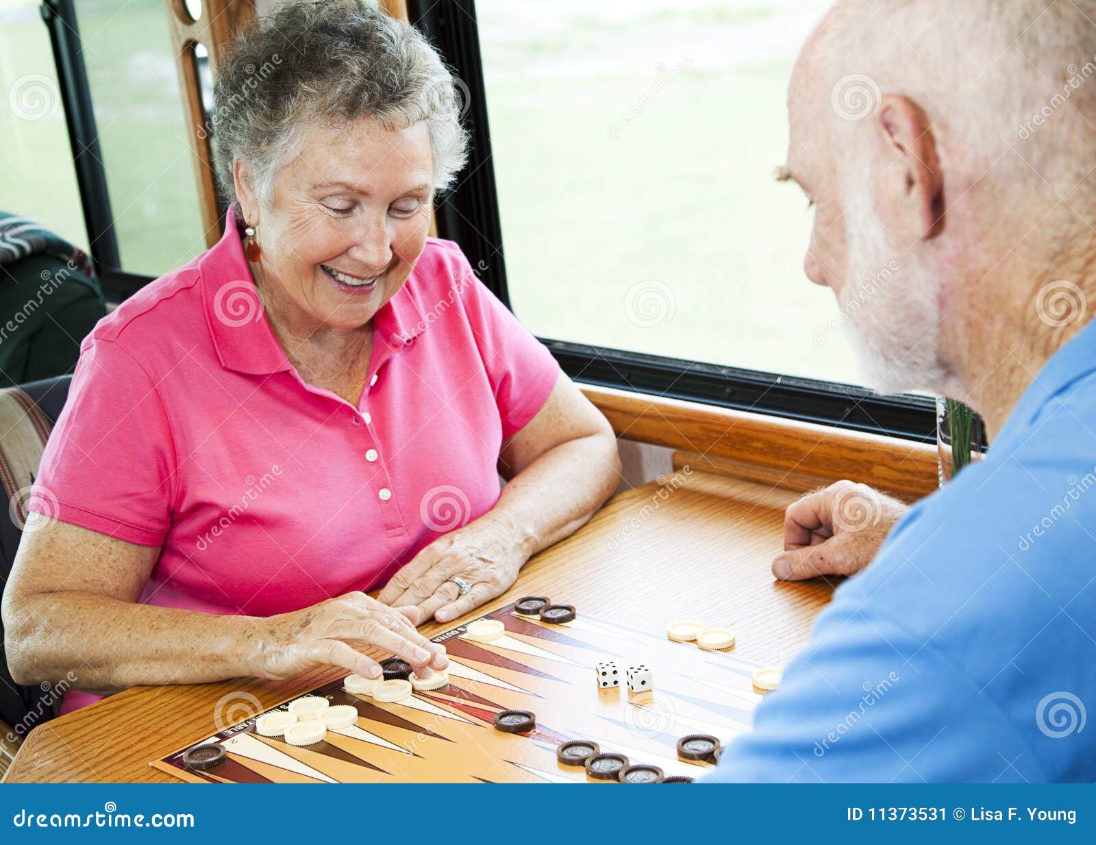 RV Seniors Play Board Game stock image. Image of person 11373531