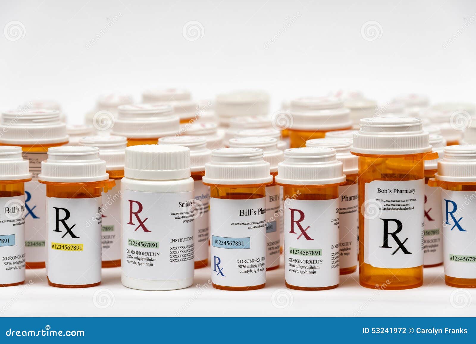 Rx Medicine Bottles. A large group of prescription bottles on a white background.