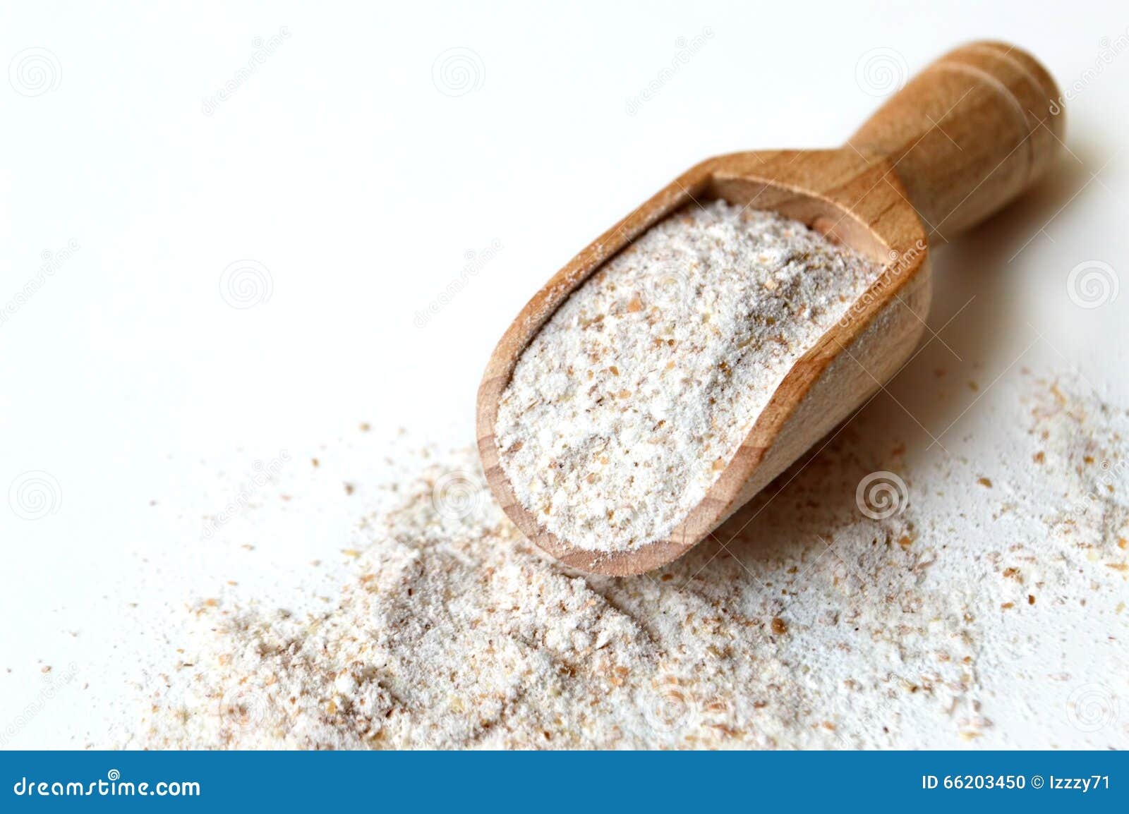 rye flour in wooden scoop