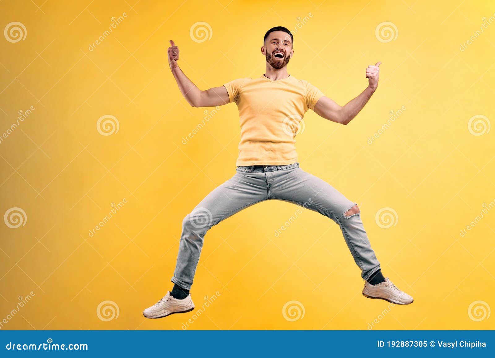 That`s Cool ! Young Man Wearing a Yellow T-shirt and Light Jeans ...