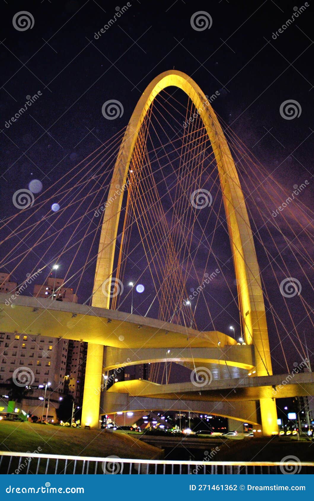 the beautiful arco da inovaÃ§Ã£o taiada bridge at night with its lighting