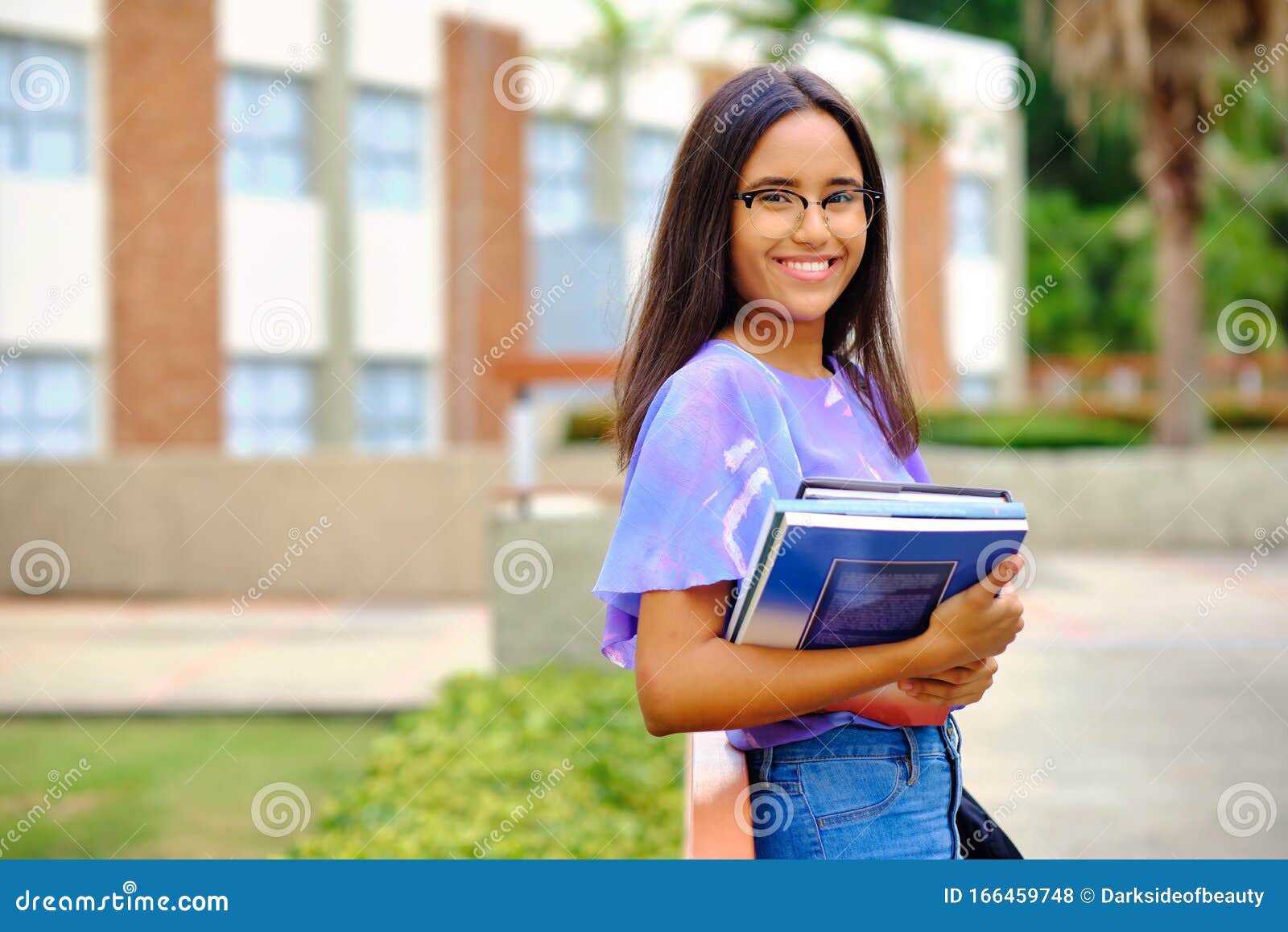 20s years student smiling outdoor in university campus
