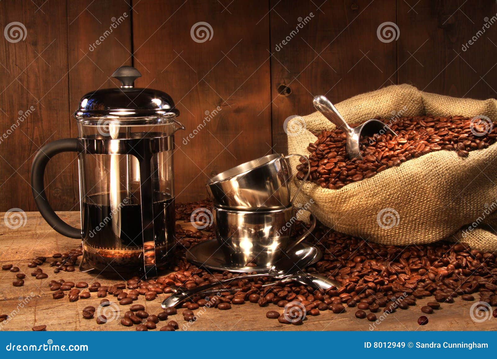 sack of coffee beans with french press