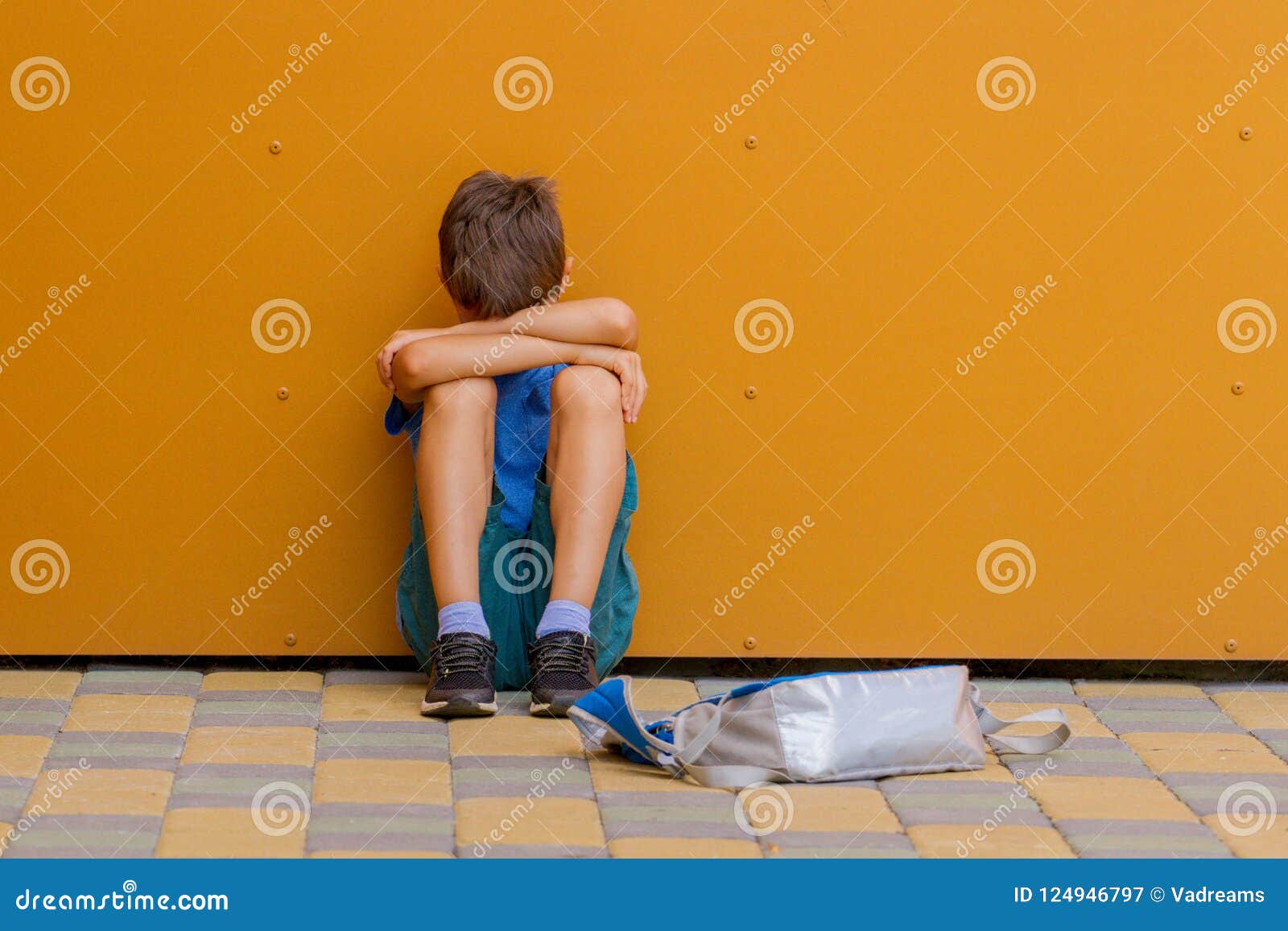 Sad Alone Boy Sitting Near Colorful Wall Outdoors Stock Image ...