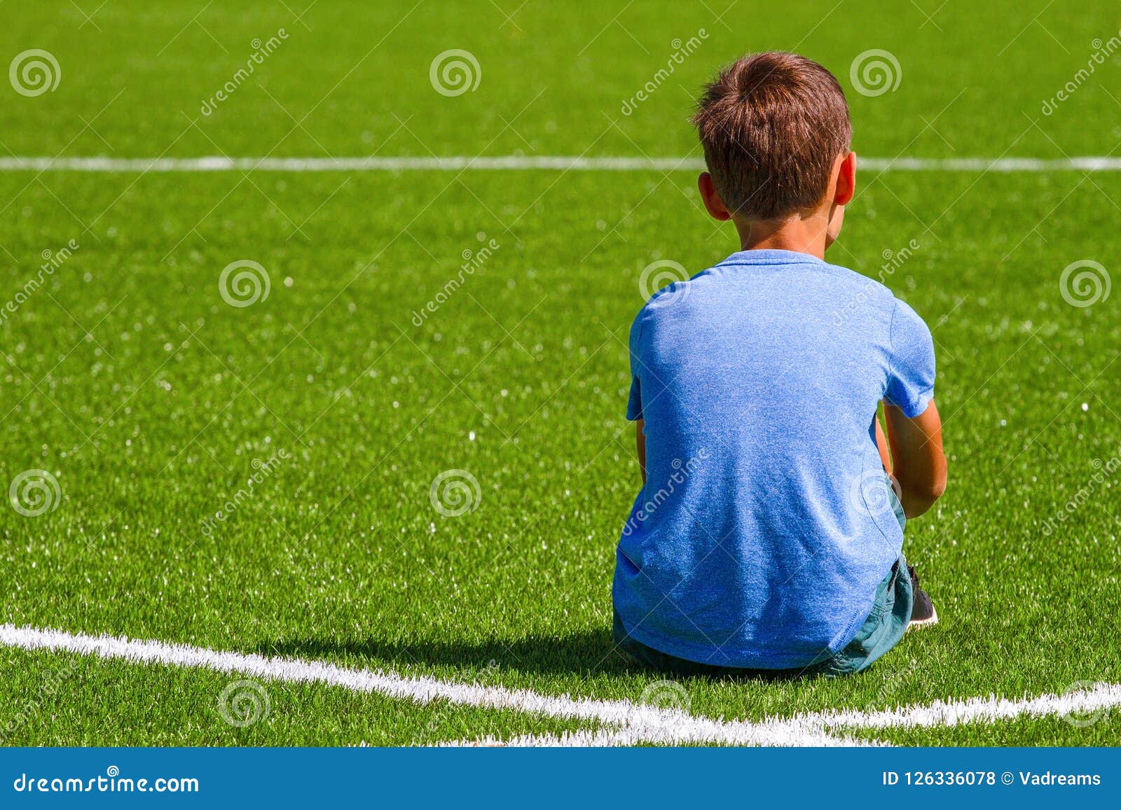 sad alone boy sitting