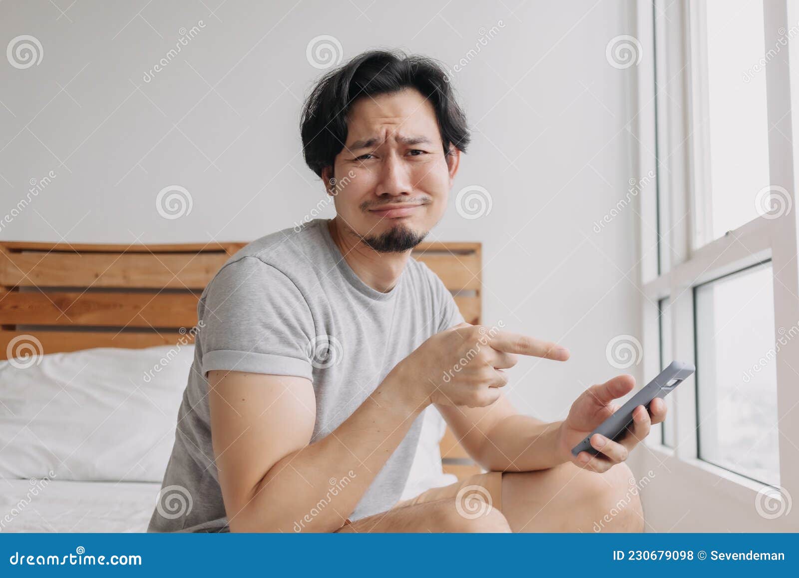 Sad Man Has Bad Online Chat News and Feels Disappointed on the Smartphone.  Stock Photo - Image of disappointment, frustration: 230679098