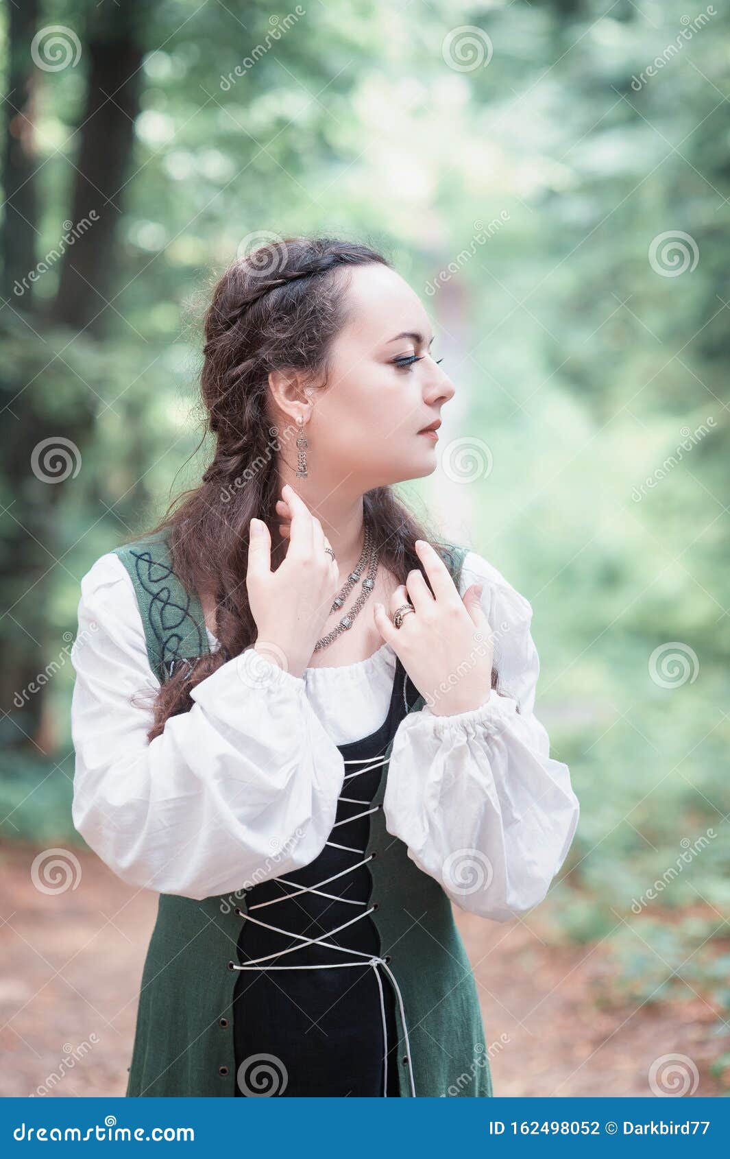 Sad Beautiful Woman in Green Medieval Dress Stock Photo - Image of ...