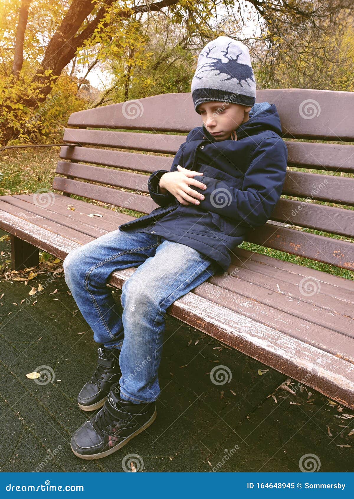 Sad Boy Sitting on Bench Alone Outdoor Stock Image Image of handsome