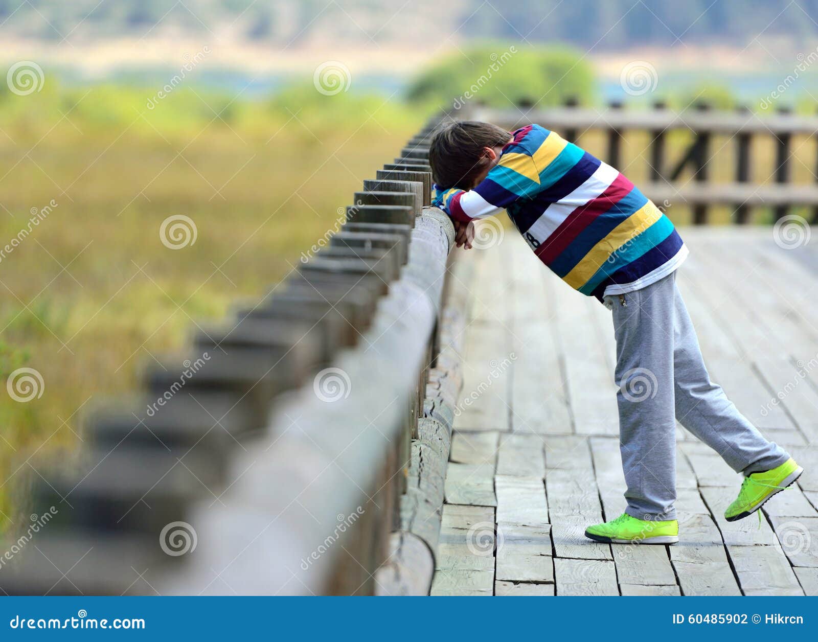 sad boy walking alone