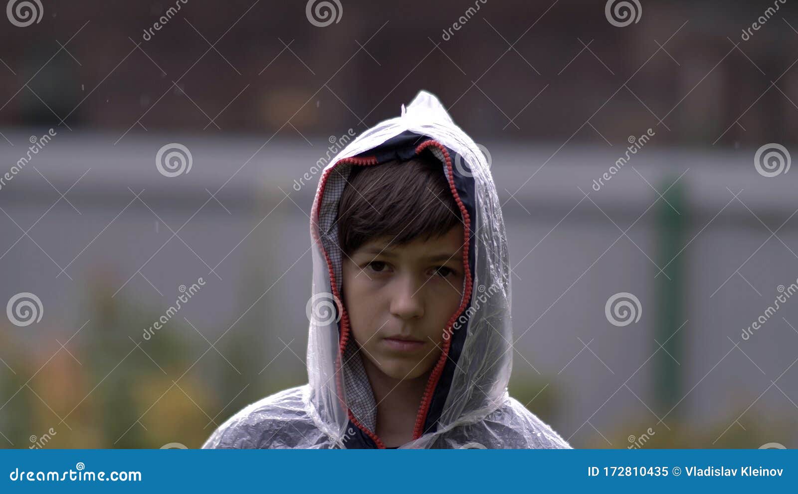 sad boy in the rain