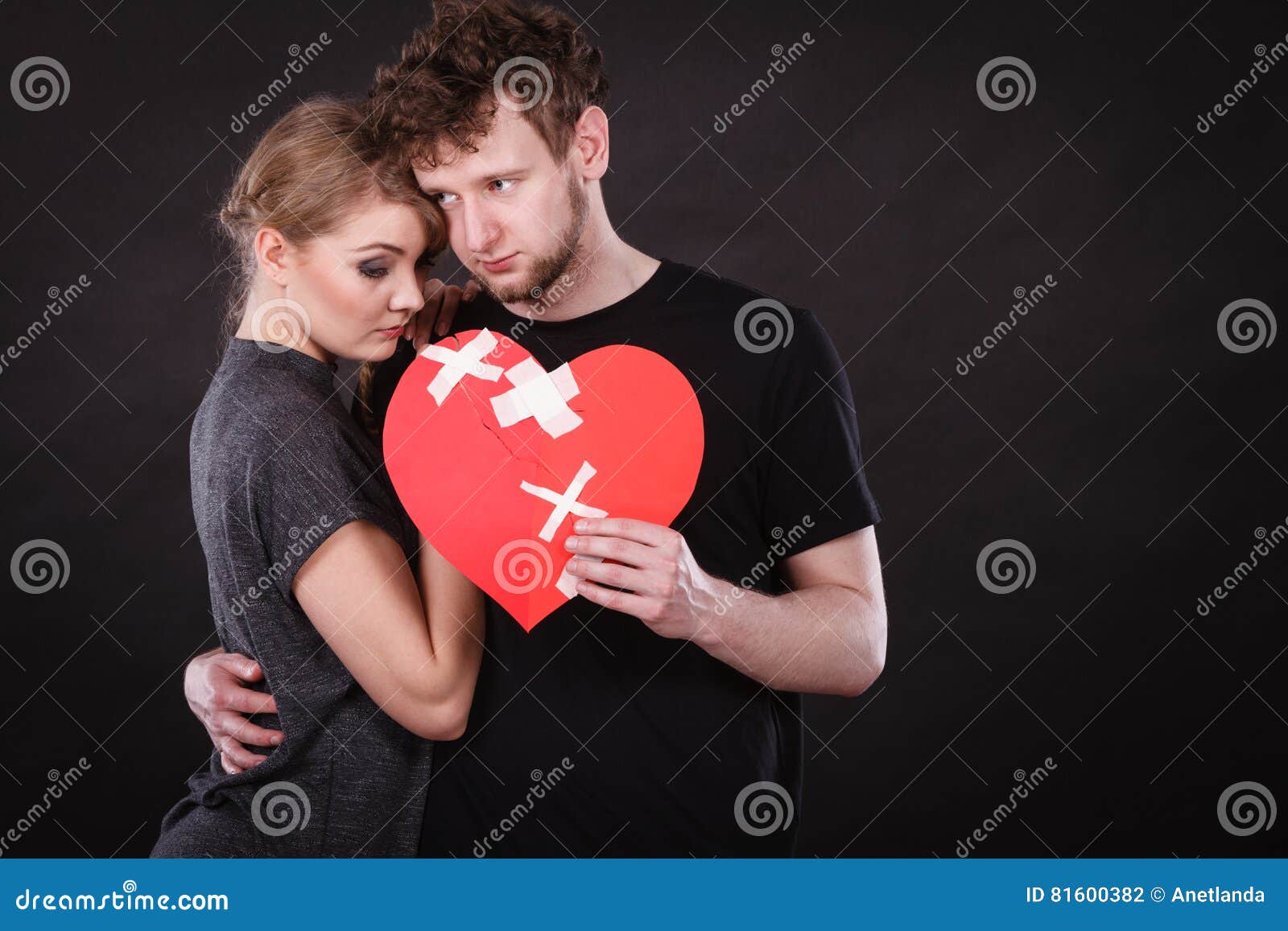 Sad Couple Holds Broken Heart. Stock Photo - Image of problem ...