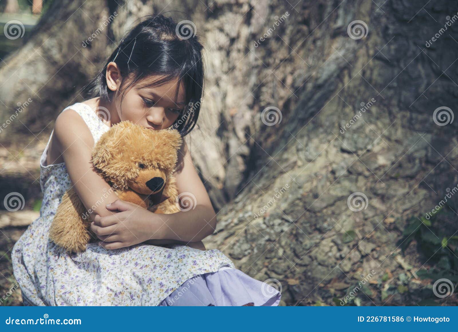 Sad Girl Hugging Teddy Bear Sitting Under Tree Sadness Alone in ...