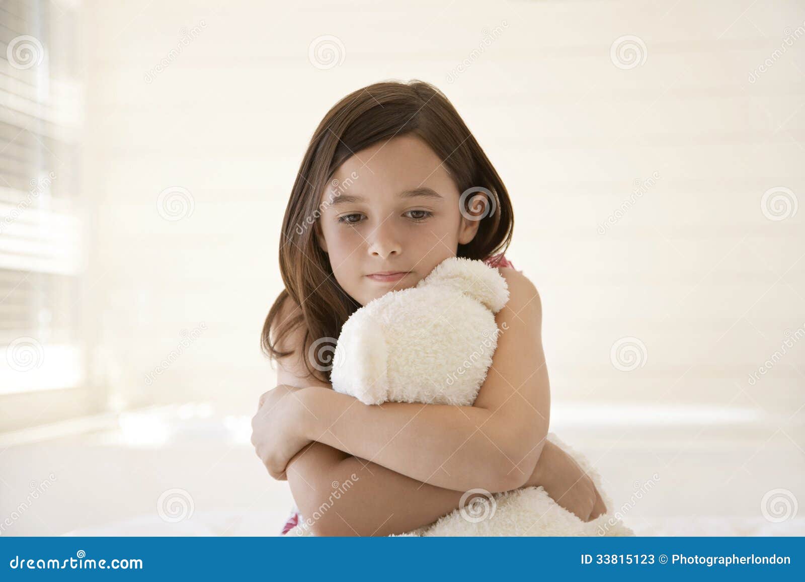 Girl Hugging Teddy Bear