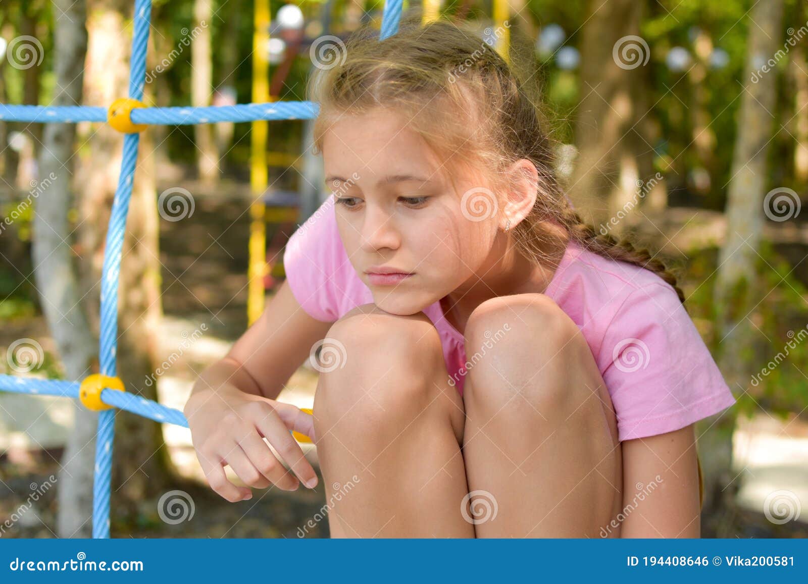 Sad Girl at the Playground. the Sad Child Became Thoughtful ...