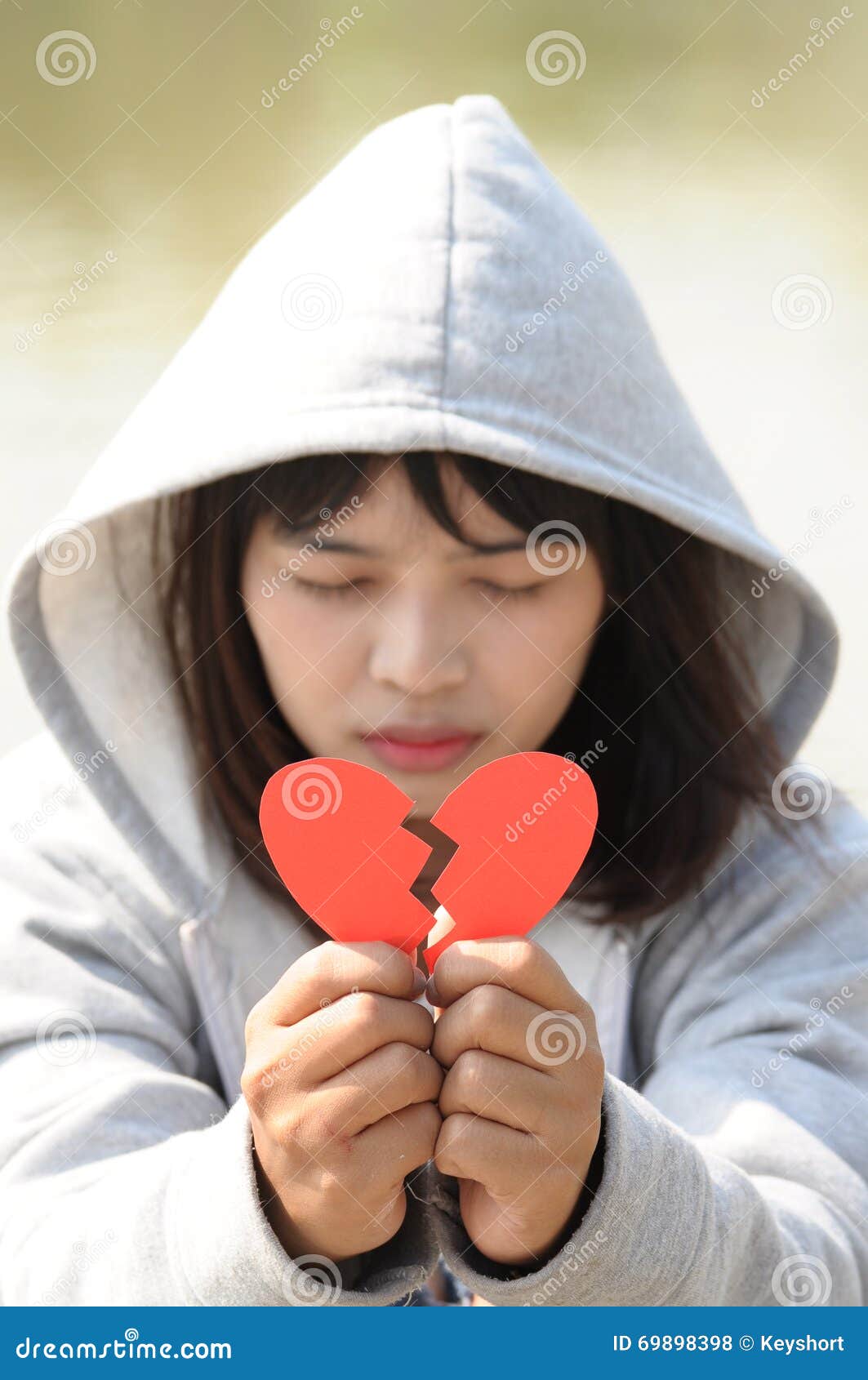 Sad Girl Praying To Reconcile from Red Broken Heart Stock Photo ...