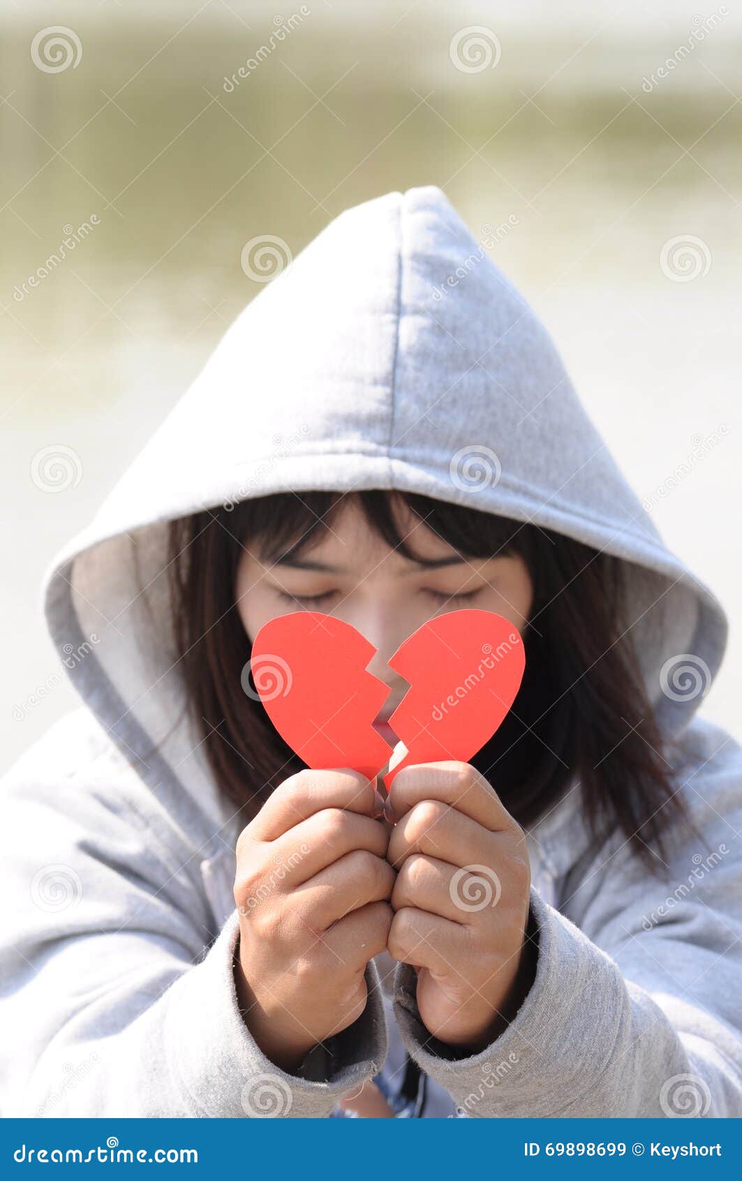 Sad Girl Praying To Reconcile from Red Broken Heart Stock Image ...