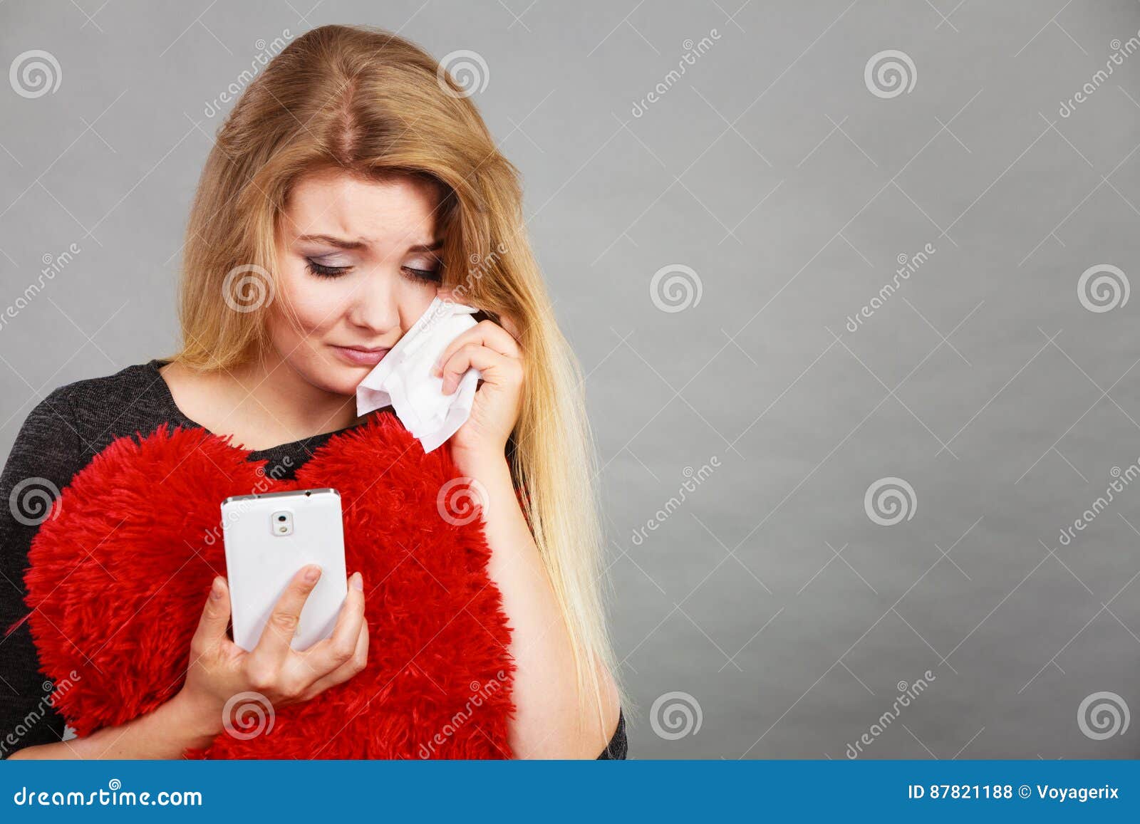 Sad Heartbroken Woman Looking at Her Phone Stock Photo - Image of ...