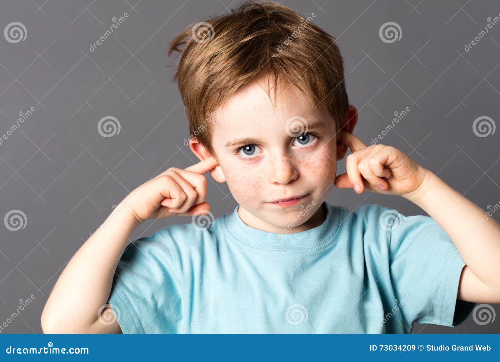 sad little boy not willing to listen to domestic violence