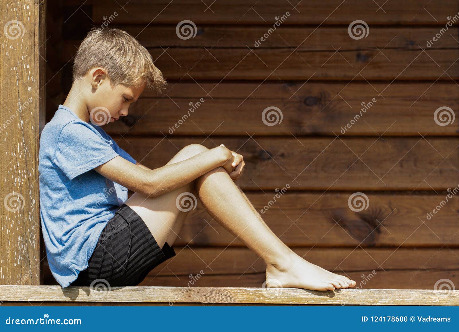 Sad Lonely Boy Sitting Outdoors Stock Photo - Image of negative ...