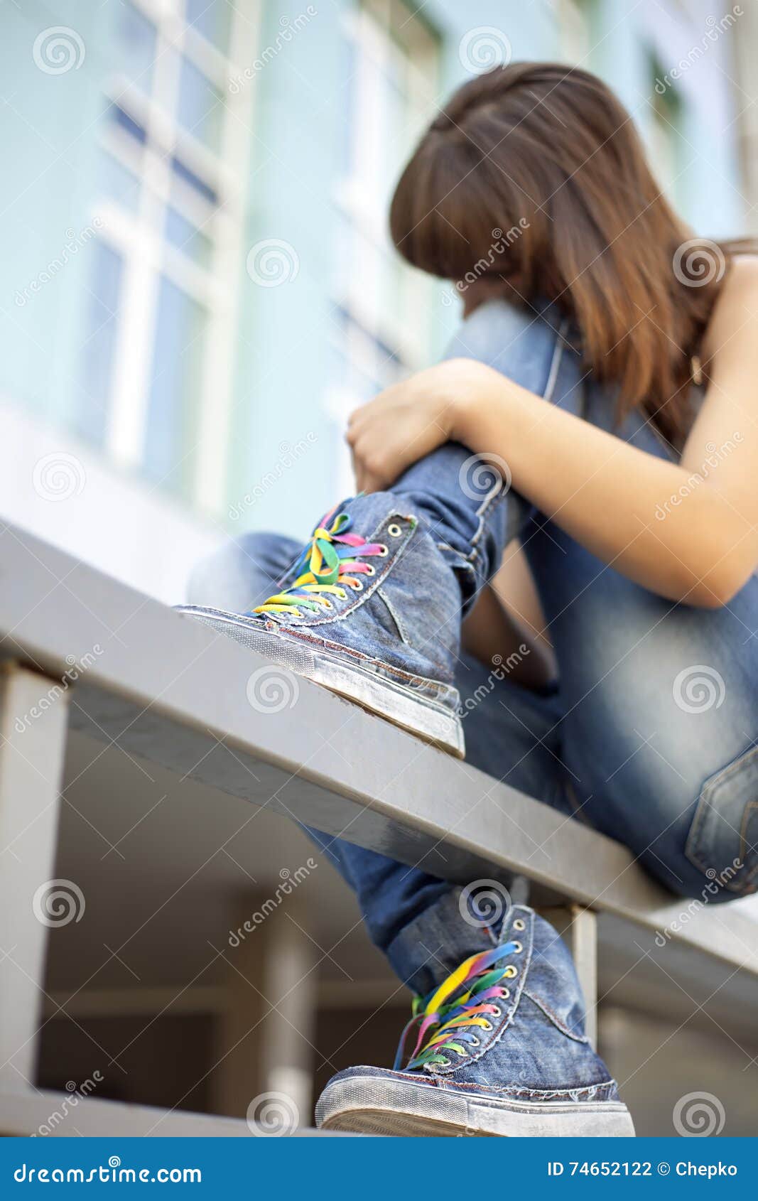 Sad Lonely Girl Meditates Sitting on the Railing of City (focus Stock ...