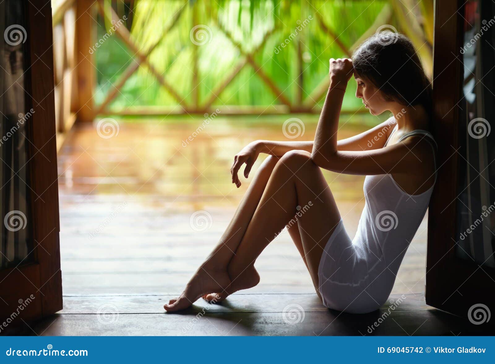 Sad Lonely Woman Sitting on the Porch during the Rain Stock Photo ...
