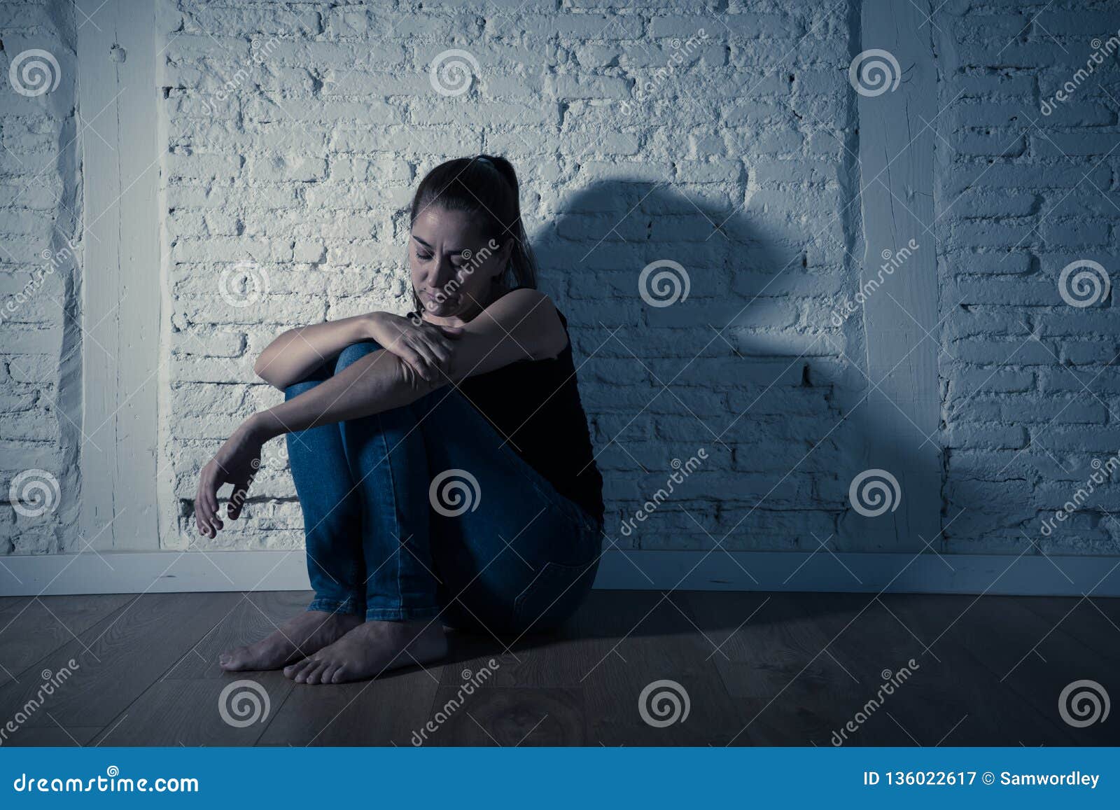 Sad Lonely Woman Suffering from Depression Sitting Alone and ...
