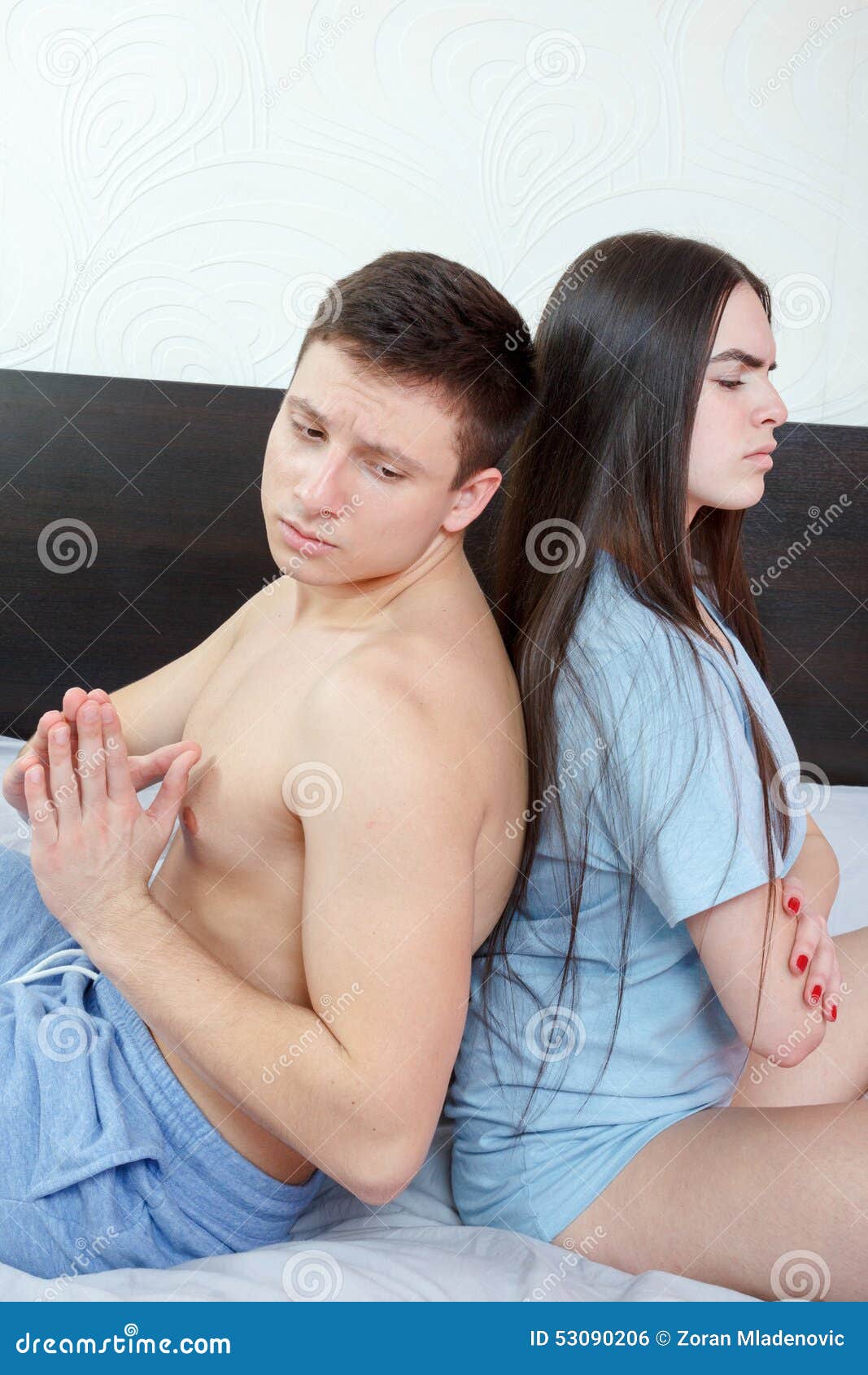 Sad Man Beging His Wife To Forgive Him Mistake Stock Photo picture