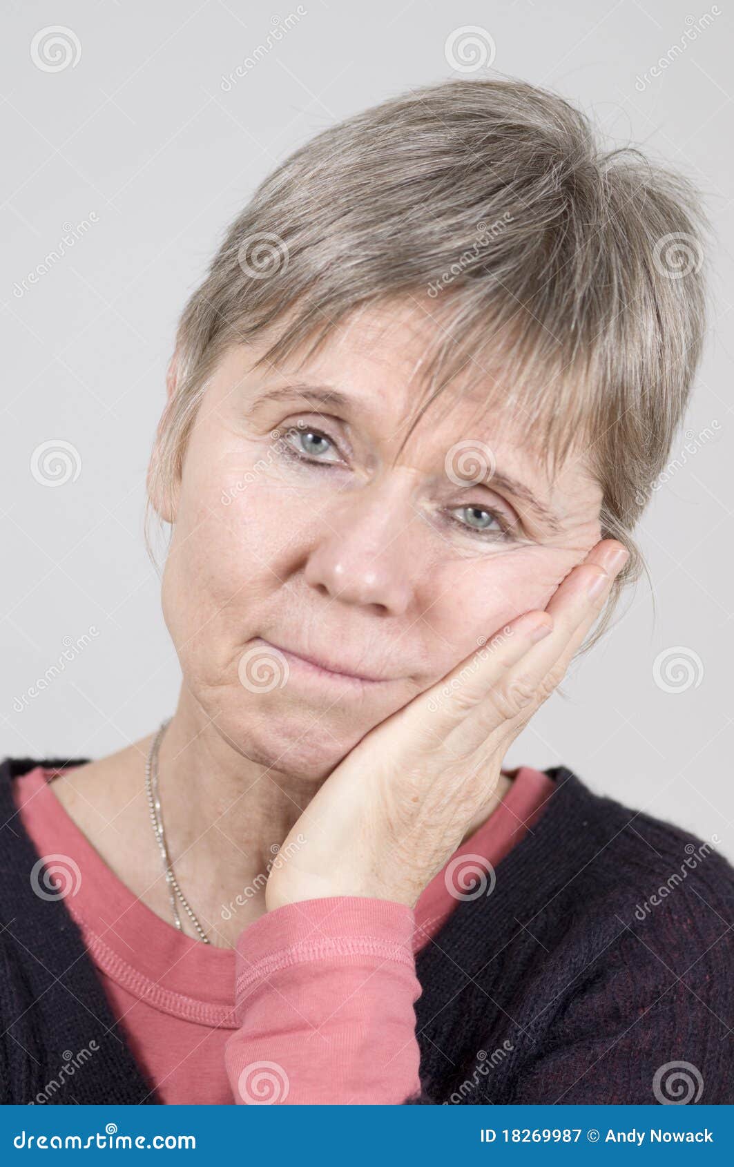 Sad Mature Senior Woman stock image.