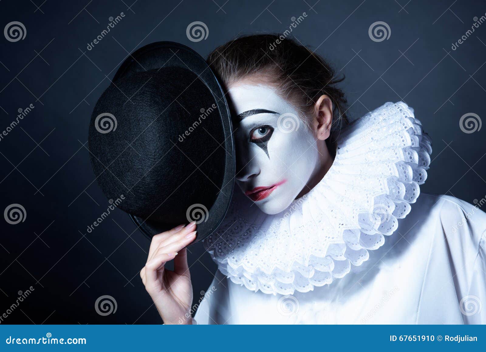 Sad Mime Pierrot Holding a Black Hat Stock Photo - Image of makeup ...