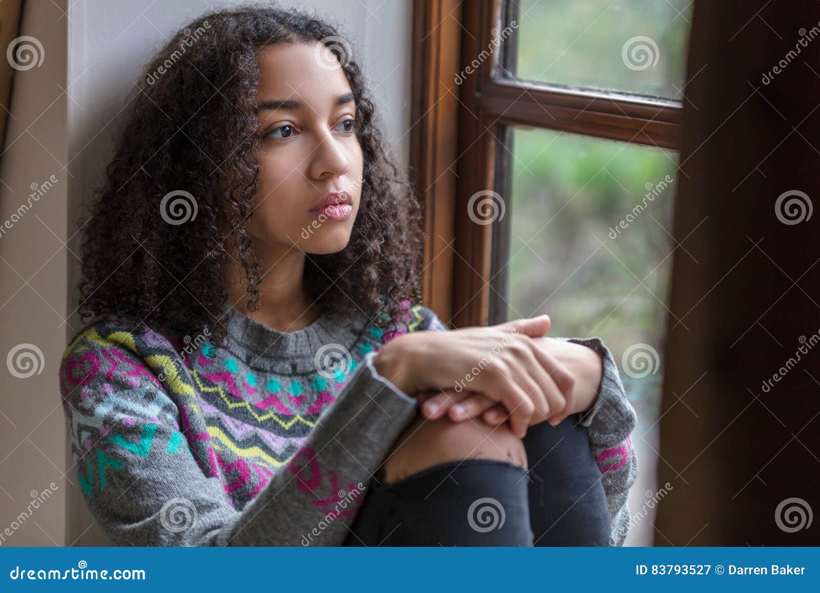 sad mixed race african american teenager woman